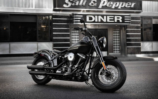 Black motorcycle parked restaurant salt - a sign free wallpaper