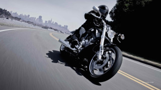 Motorcycle ride city background sunny - a blurry photo free wallpaper